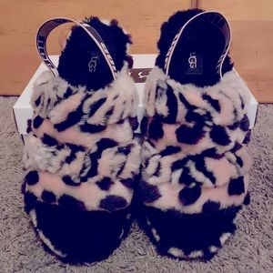 Baby pink cheetah print UGG slippers.